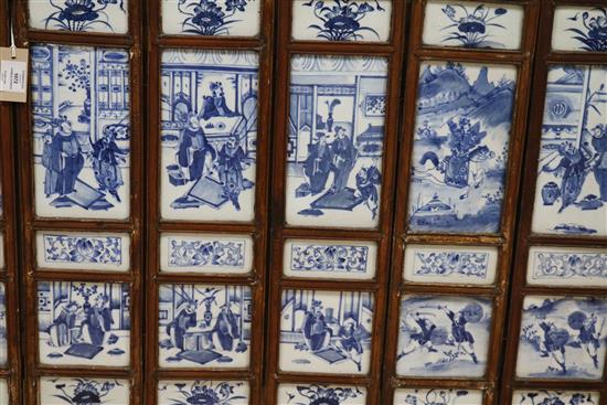 A 19th century Chinese blue and white porcelain panelled screen length 136cm